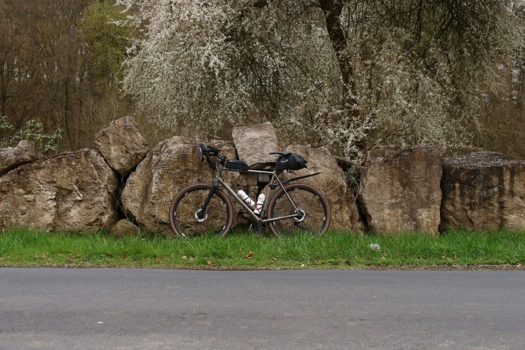 Close-up of gravel bike tyres on a rural bridleway
